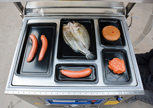 贴体真空包装机使用现场